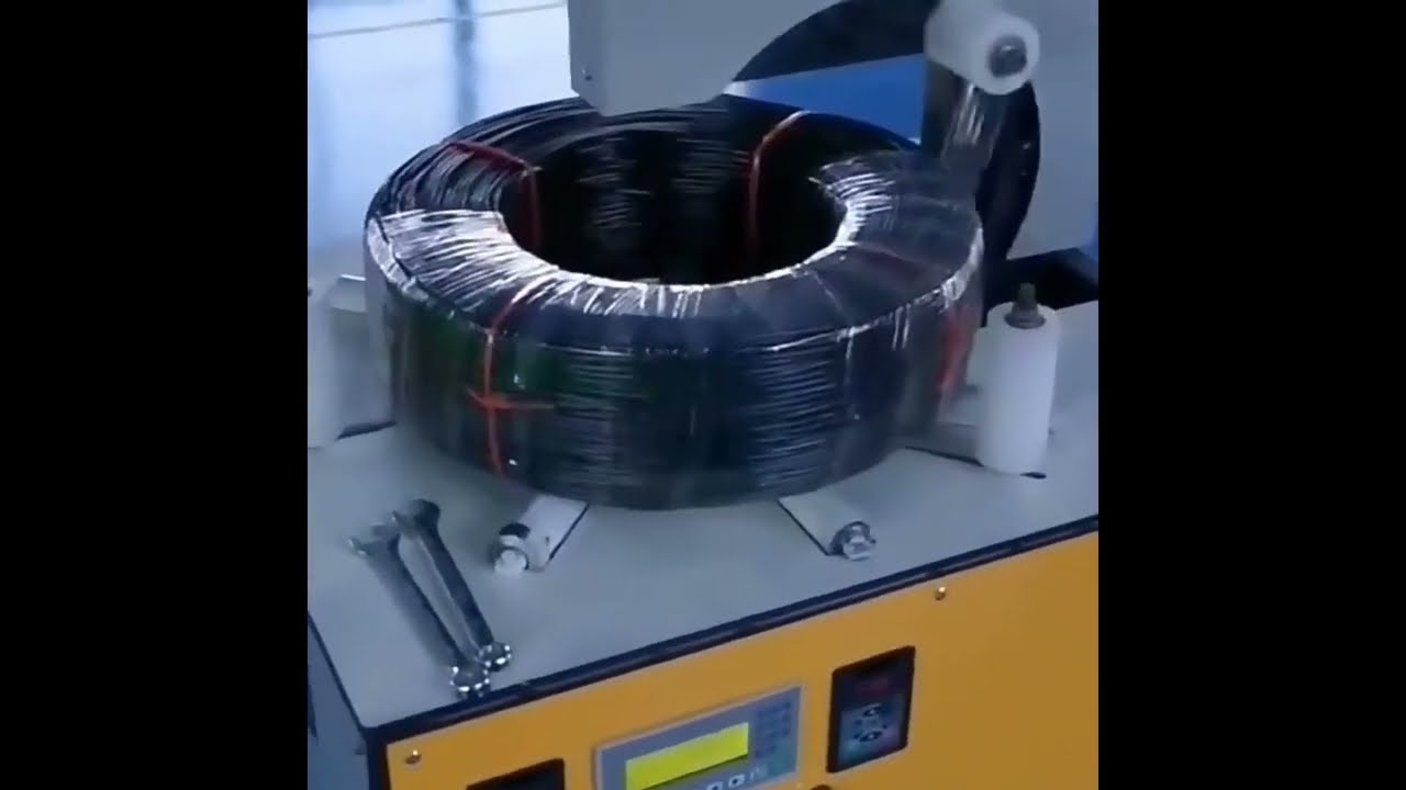Máy quấn màng co giãn Bindle Belt cho cuộn dây cáp và sản phẩm rỗng - Đóng gói tự động hiệu quả