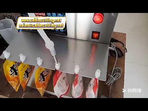 Máy chiết rót định lượng sữa tươi dạng túi đứng (doypack) tự động bằng điện
